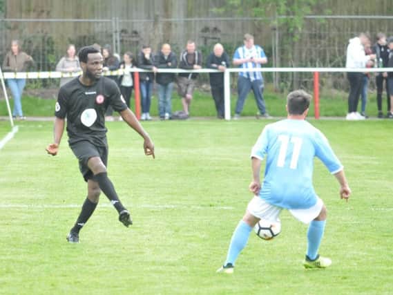 Pascal Chimbonda in action for the legends game at Ashton Town last year