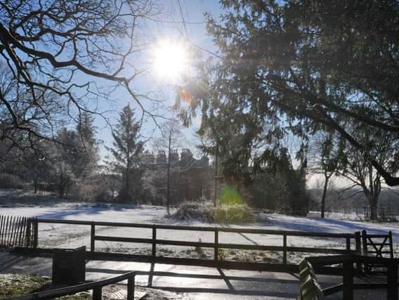 A winter scene at Haigh Woodland Park, as snow falls over Wigan.  Picture by Michelle Adamson