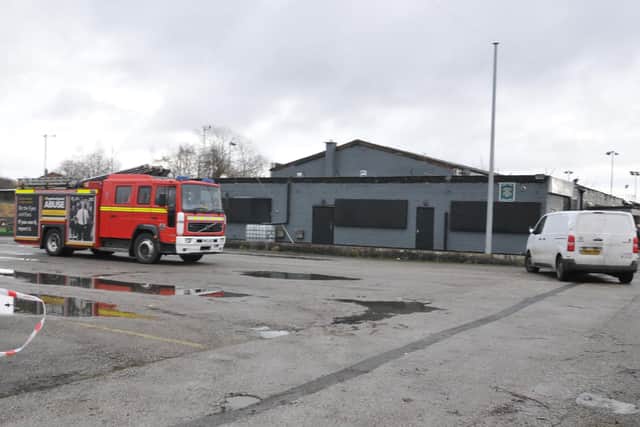 Firefighters remained at Mr Earl's Sports and Social Club on Monday morning