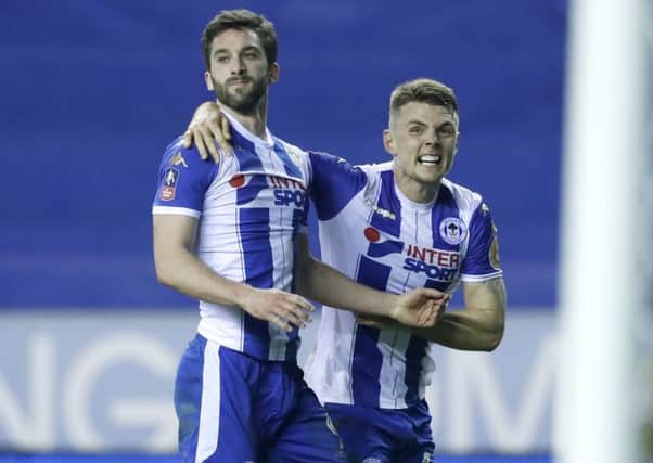 Will Grigg, with Max Power