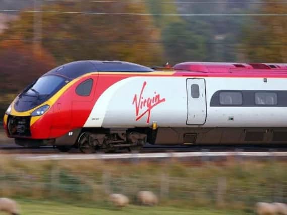 Virgin Trains services on the West Coast Mainline are delayed due to weather-related issues in Lockerbie, Scotland.