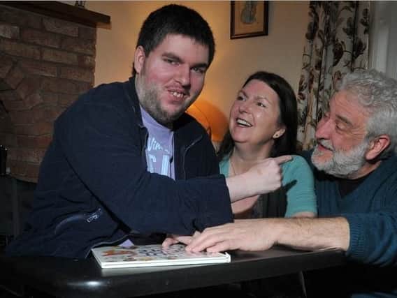 Robert, Jackie and John Fletcher