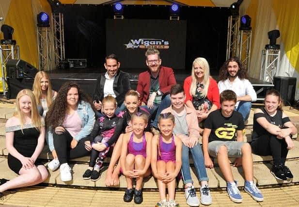 Finalists from last years Wigans Got Talent competition held at Haigh Woodland Park with the judges