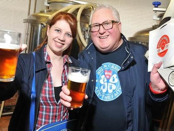 Wigan CAMRA members, Jo Ashton, left, and Brian Gleave, at the launch of the 32nd Wigan Beer Festival