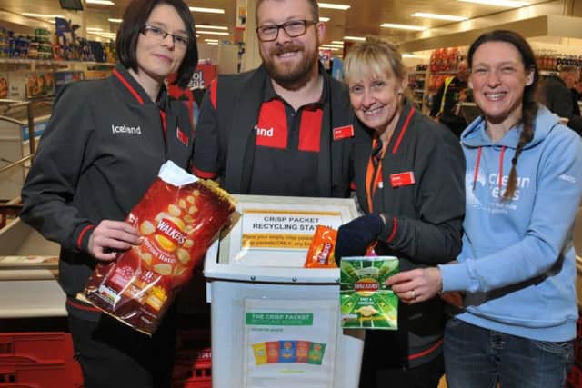 Iceland staff, Rebecca Elsden, Bradley Wainwright and Karen Evans, pictured with environmental campaigner Helen Dryden, and the Terracycle  project, encouraging customers to recycle empty crisp packets.