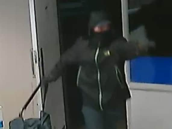 CCTV images show the robber