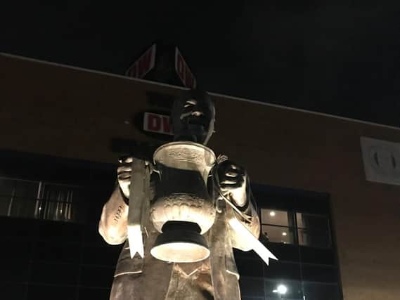 The vandalised statue at the DW Stadium on Sunday night
