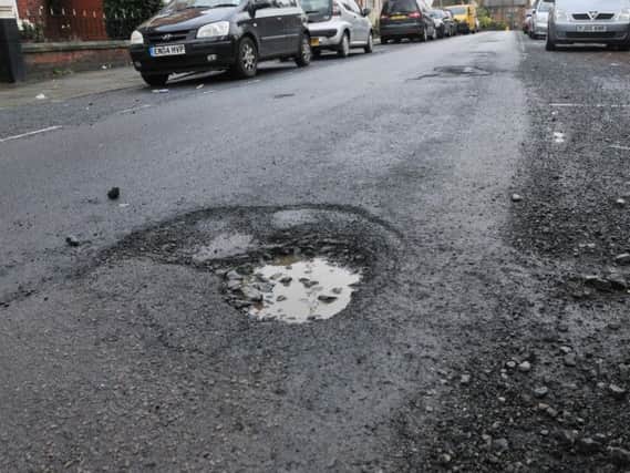 A pothole on a Wigan street
