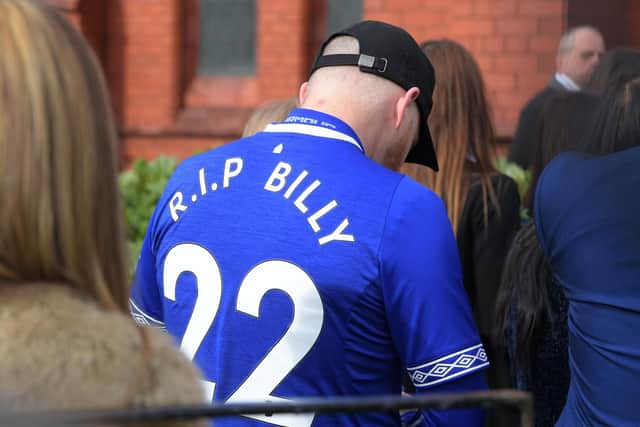 A mourner at Billy's funeral