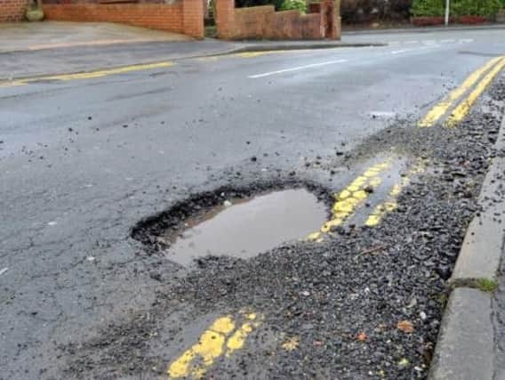Wigans main roads do still have potholes but not as many as in 2017