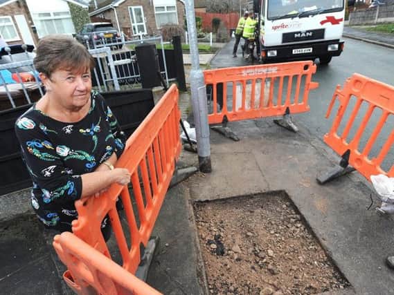 Carol Horrocks is fed up with having the pavement outside her house being repeatedly dug up by workers