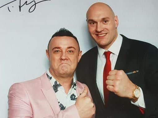 Lee Michaels with Tyson Fury after they sang together