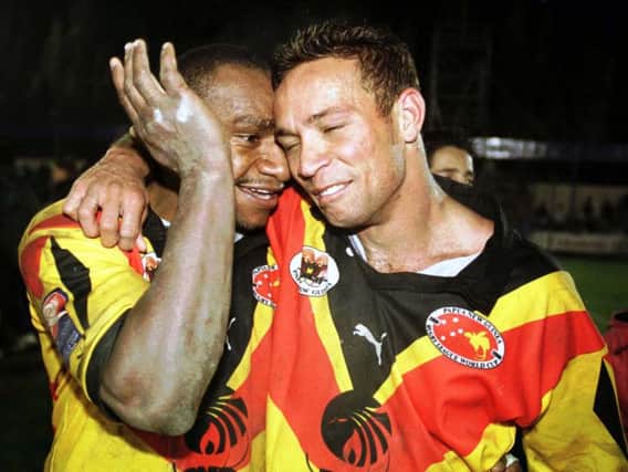 Adrian Lam and Stanley Gene celebrate after PNGs World Cup win against Tonga in 2000. Picture: Getty Images