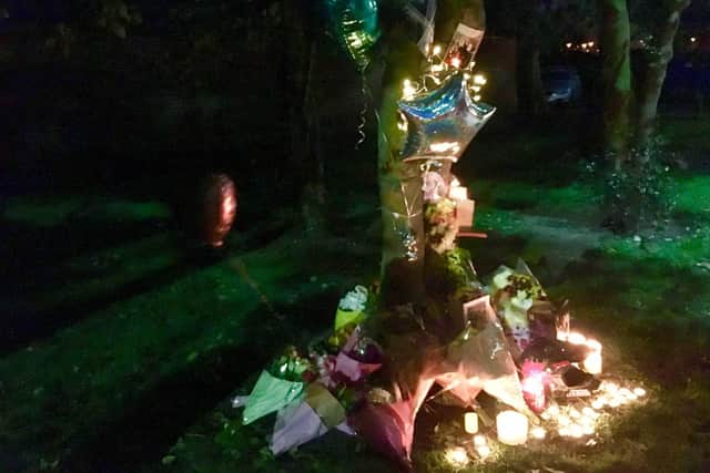 A tree on Wigan Road was adorned with flowers, pictures and messages