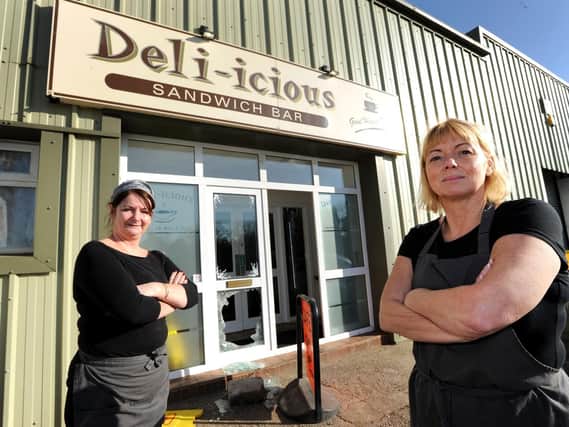 Sarah Clarke (right) and Stella Dixon, from the Deli-icious cafe, who had a break-in last night.