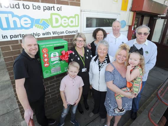 The unveiling of the defibrillator at Garswood Hall Bowling and Community Club