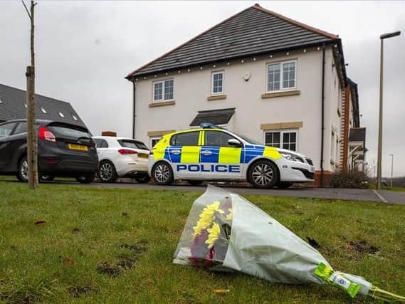 Flowers have been left outside a house on Fleming Court in Shevington in honour of the baby girl. Pic: Peter Byrne/PA Wire