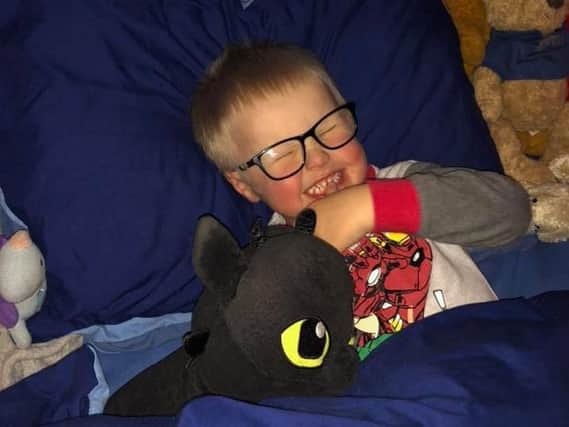 Freddie snuggles with Toothless
