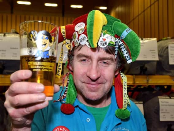 Volunteer Barman Joel Garnett at this year's Wigan Beer Festival