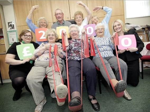 Front, from left, Serena Finlayson of Yorkshire Building Society (YBS), Alice Judge, Edna Newton, Masey Hunter and Laura Armitage, also of YBS. Back, Betty Breare, Mick Hodlin, Margaret Baxter and Joan Allen show how they take part in their Strength and Balance Exercise Class.