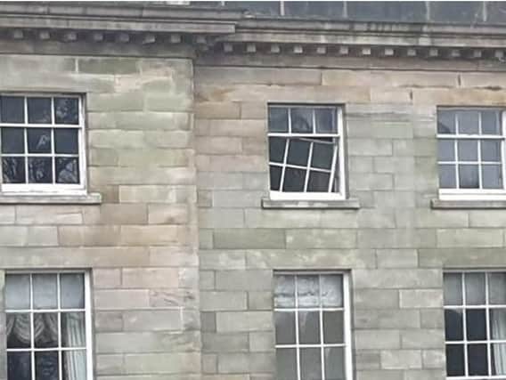 A window apparently falling out at Haigh Hall