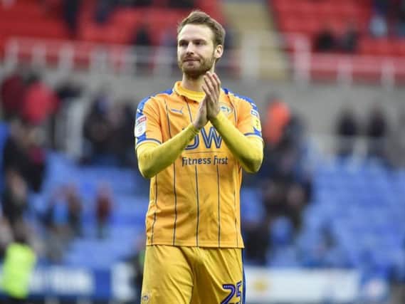 Nick Powell applauds the Latics fans at Reading