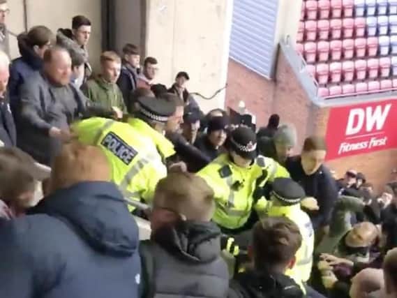 Bolton supporters clashed with police at the DW Stadium. Captured by Reece Jones