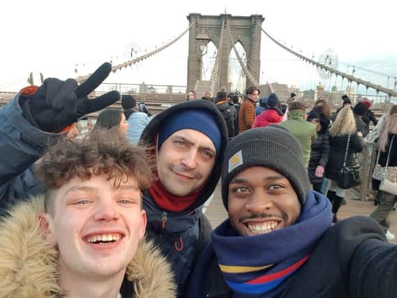 Rhys Long takes a selfie on the Brooklyn Bridge