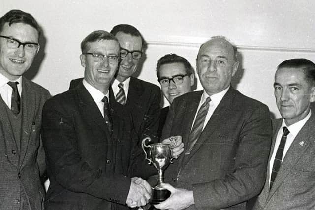 Jack presents trophies to Wigan Angling Society in 1966