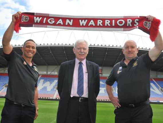 Shaun Edwards posing for pictures at the DW Stadium last August