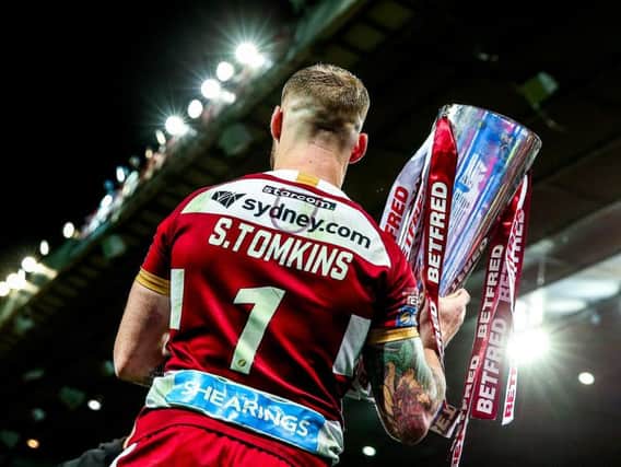 Sam Tomkins bowed out  with a Grand Final success