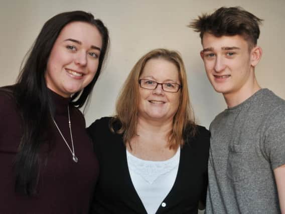 Proud mum Kim Smith with her children