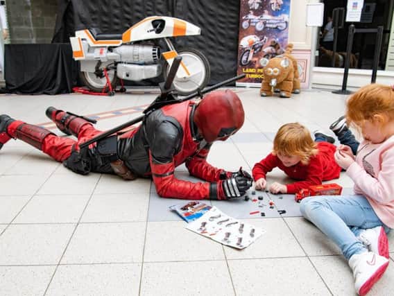 Deadpool meets some young fans