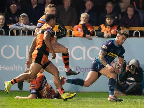 Oliver Gildart heads for one of his two first-half tries