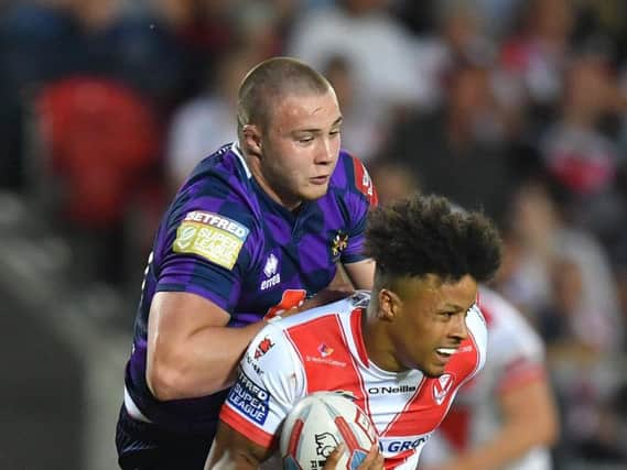 Jack Wells in Wigan action against St Helens