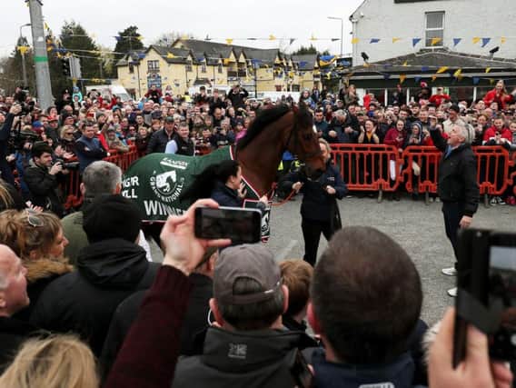 2019 Grand National Winner Tiger Roll with owner Michael O'Leary (right) during the parade through Summerhill, County Meath, Ireland