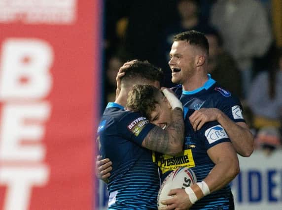 Oliver Gildart congratulates George Williams