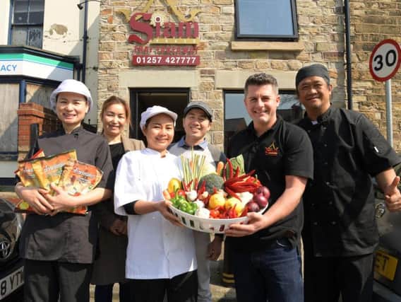 Ed Jennings and his team at Siam House Thai takeaway in Standish showing off some of the fresh ingredients used in their cooking