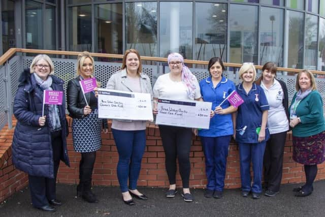 Sam and mum Andrea (centre) with Janet Pennington (far left) Janet Ellison (second from left) Janet Irvine (far right) and staff from the Cancer Care Centre