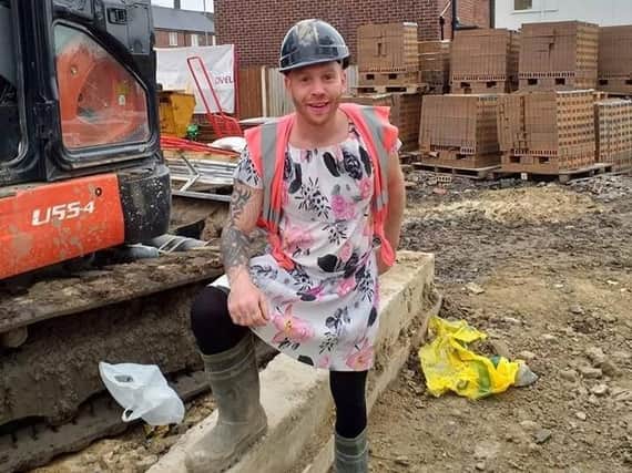 Darren in his fetching outfit on site