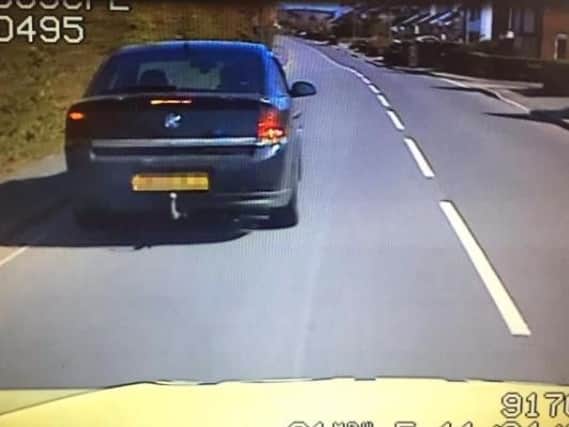 Police chased the Vectra before arresting the driver