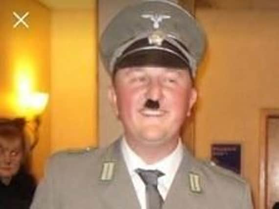 Coun Seve Gomez-Aspron dressed at Hitler at the fundraiser