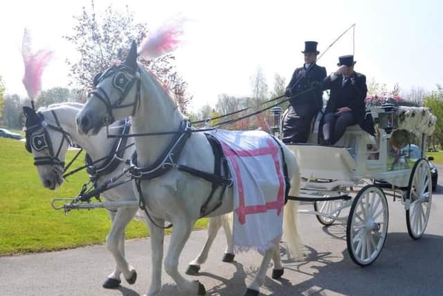 The funeral procession arrives at Howe Bridge Crematorium