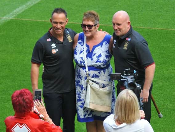 Shaun Edwards posed for pictures with Wigan fans after his unveiling at the DW Stadium with Adrian Lam last August