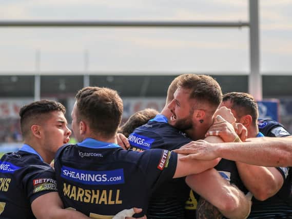 Liam Marshall (second from left) celebrates victory at Salford