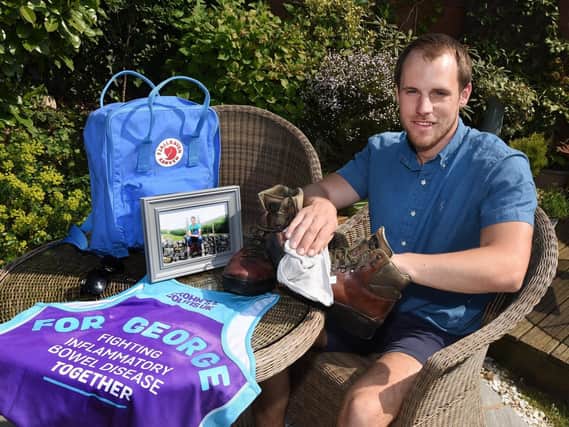 Sam Robinson prepares his gear for the walk up Helvelyn to raise money for research into Crohns disease following the death of his brother George