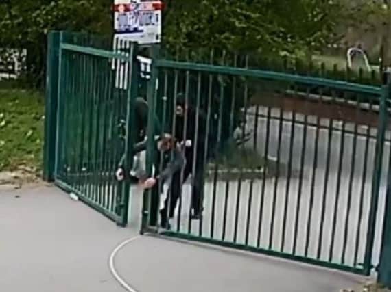 CCTV footage shows the three breaking the locks and entering