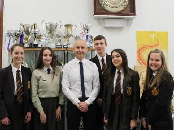 Shaun Cunliffe with some of the Orrell St Peters pupils supporting him