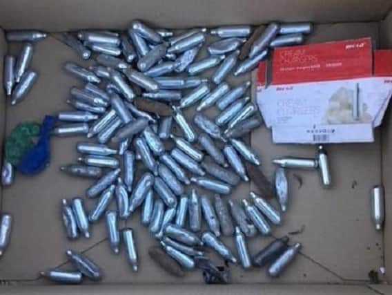 Gas canisters collected from Armoury Bank in Ashton
