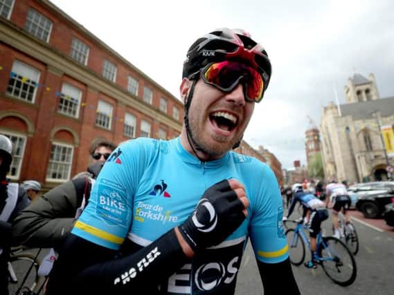 Chris Lawless celebrates winning the Tour de Yorkshire